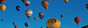 Colorful hot air balloons on a blue sky